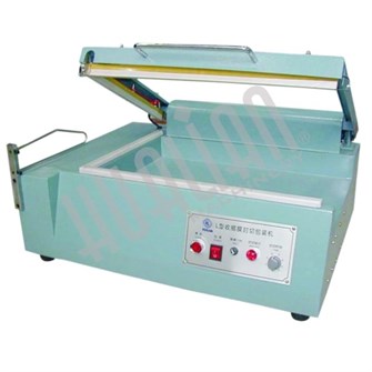 {{photo.Alt || photo.Description || 'Аппарат упаковочный для L-образной запайки и отрезки BSF-501'}}