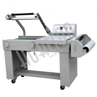 {{photo.Alt || photo.Description || 'Упаковочная машина BSL-7560L'}}